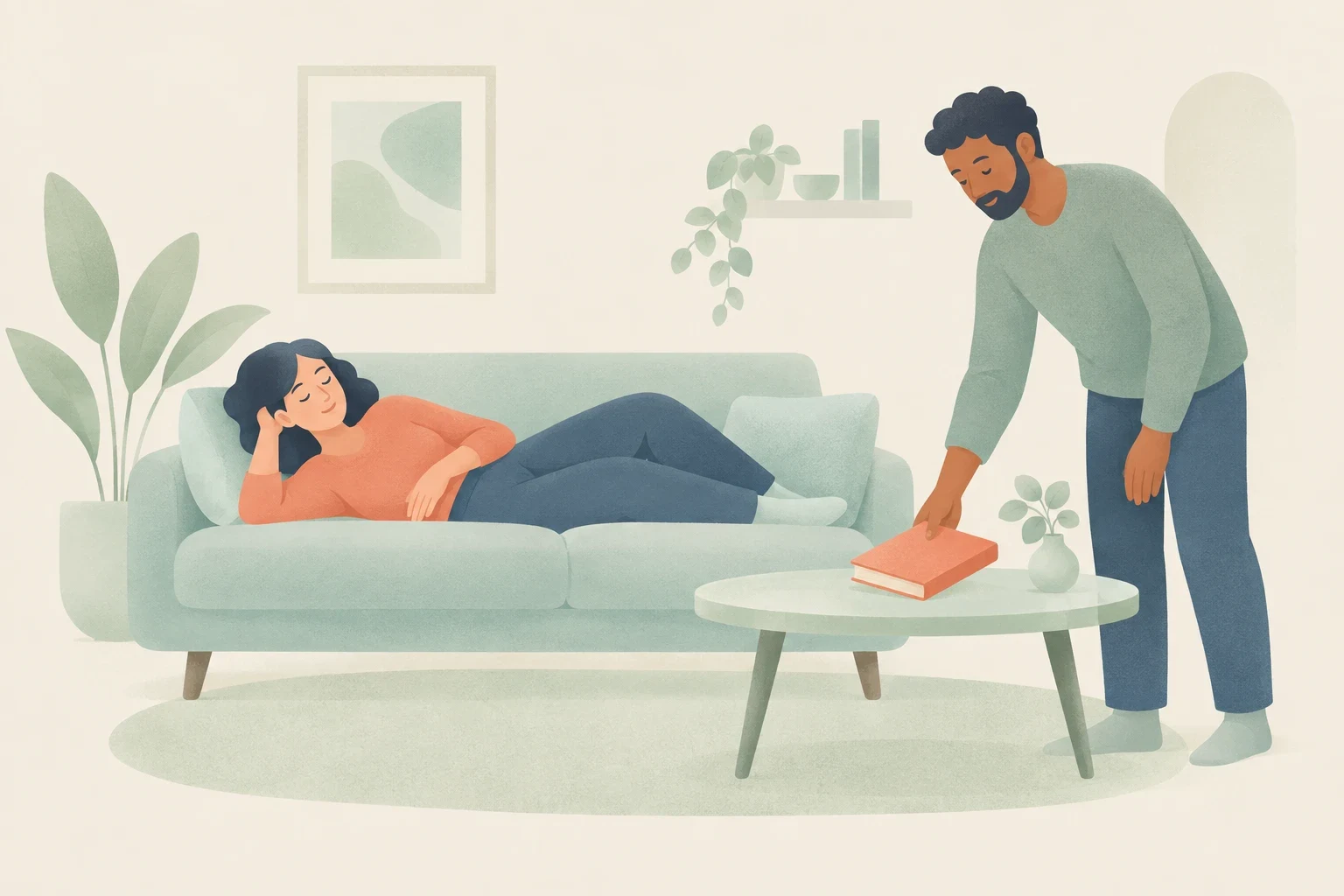 A woman lies resting on a living room couch while a man lays a book down on a coffee table.